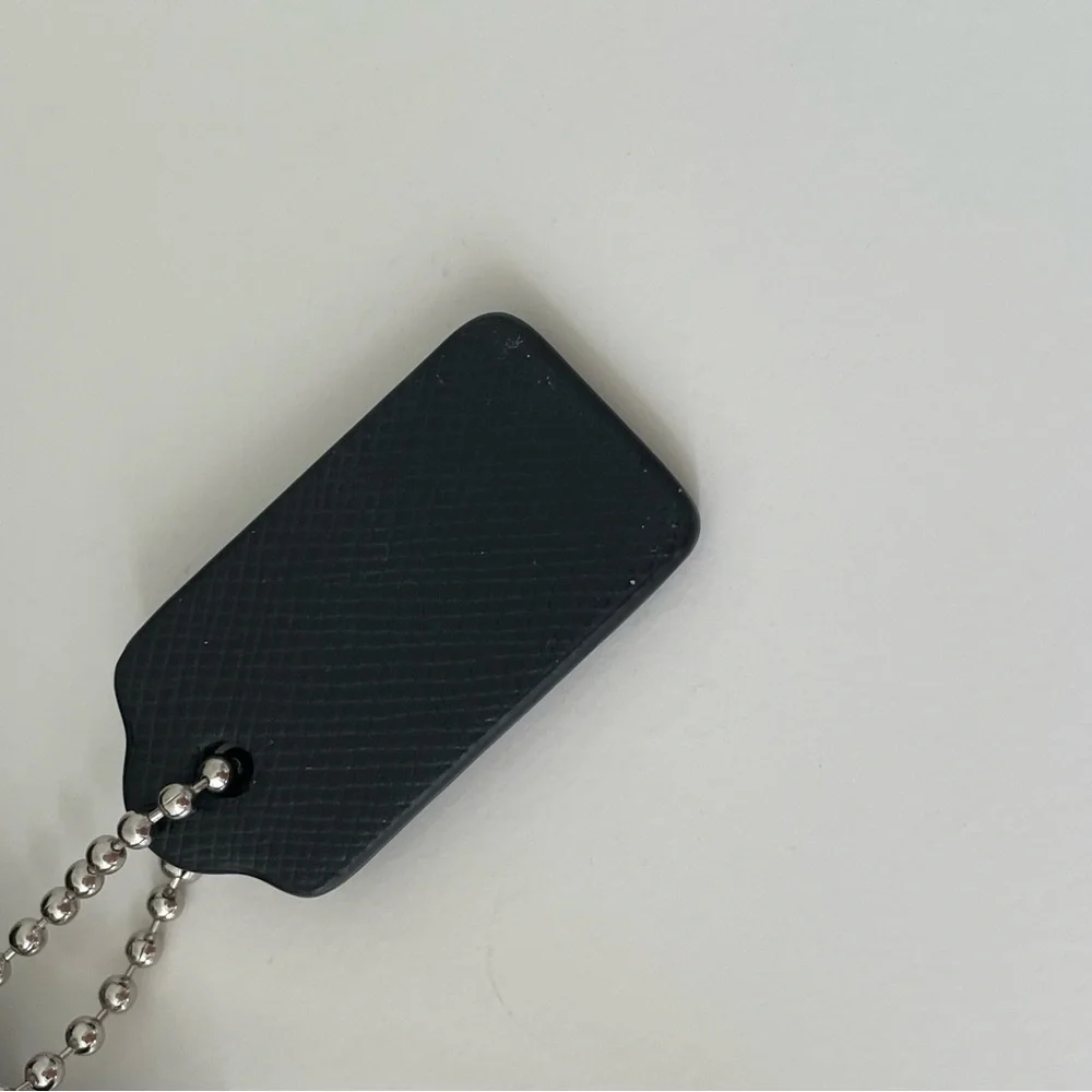 Coach Bow wristlet | Black Leather
